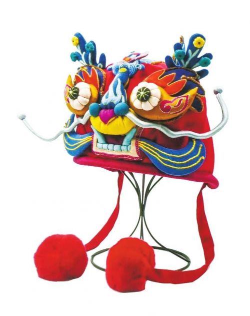 A hand-embroidered traditional Chinese tiger-head hat from Qianyang